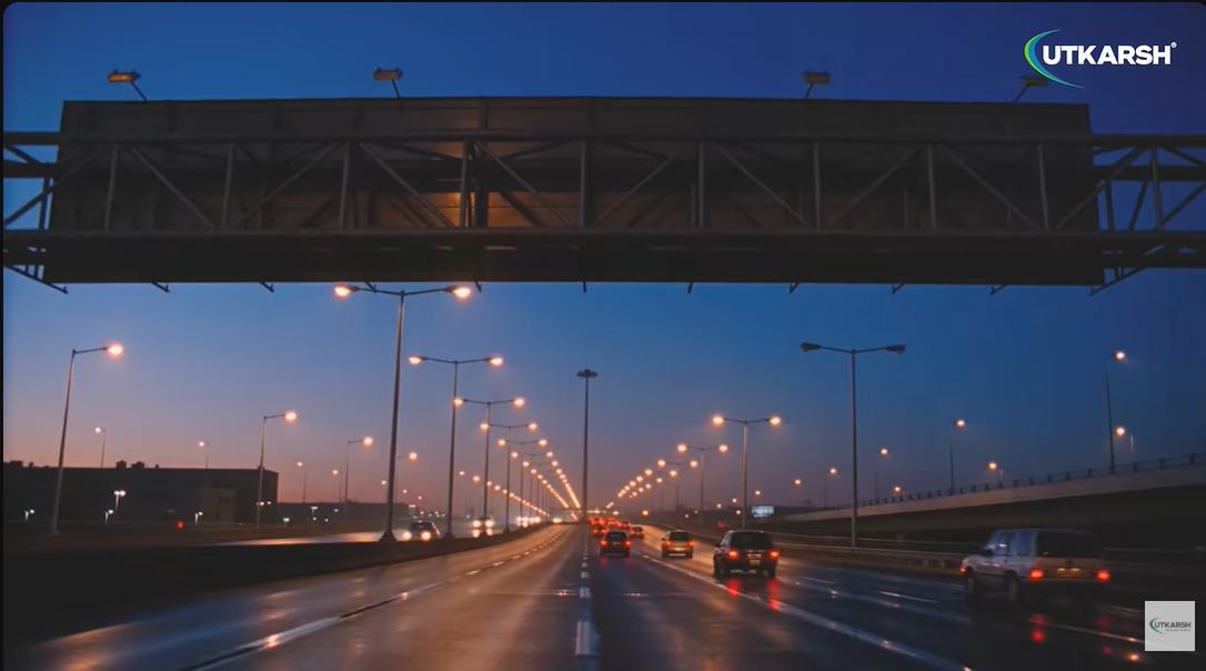 Modern highway illuminated by streetlights at night